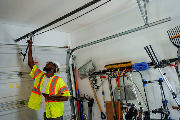 Professional Garage Door Panel Replacement technician working in Holyoke, MA
